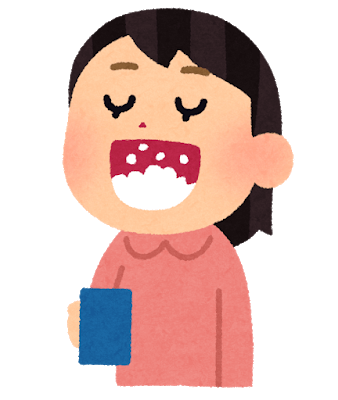 女の子がウガイをしている